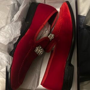 Red slip on dress shoes. Worn once. in great condition.